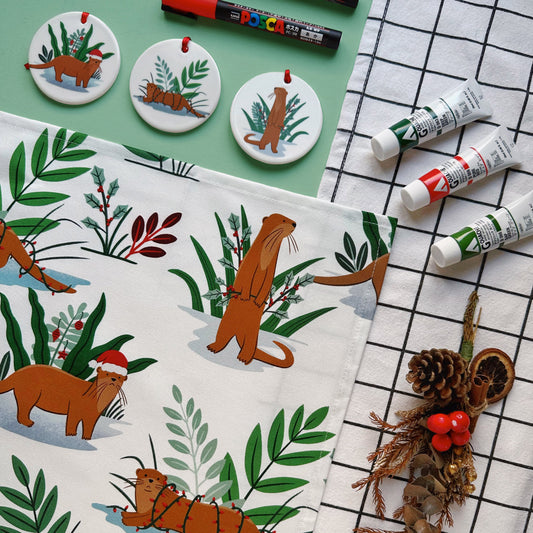 Christmas Sea Otters/ Honbills Tea Towel